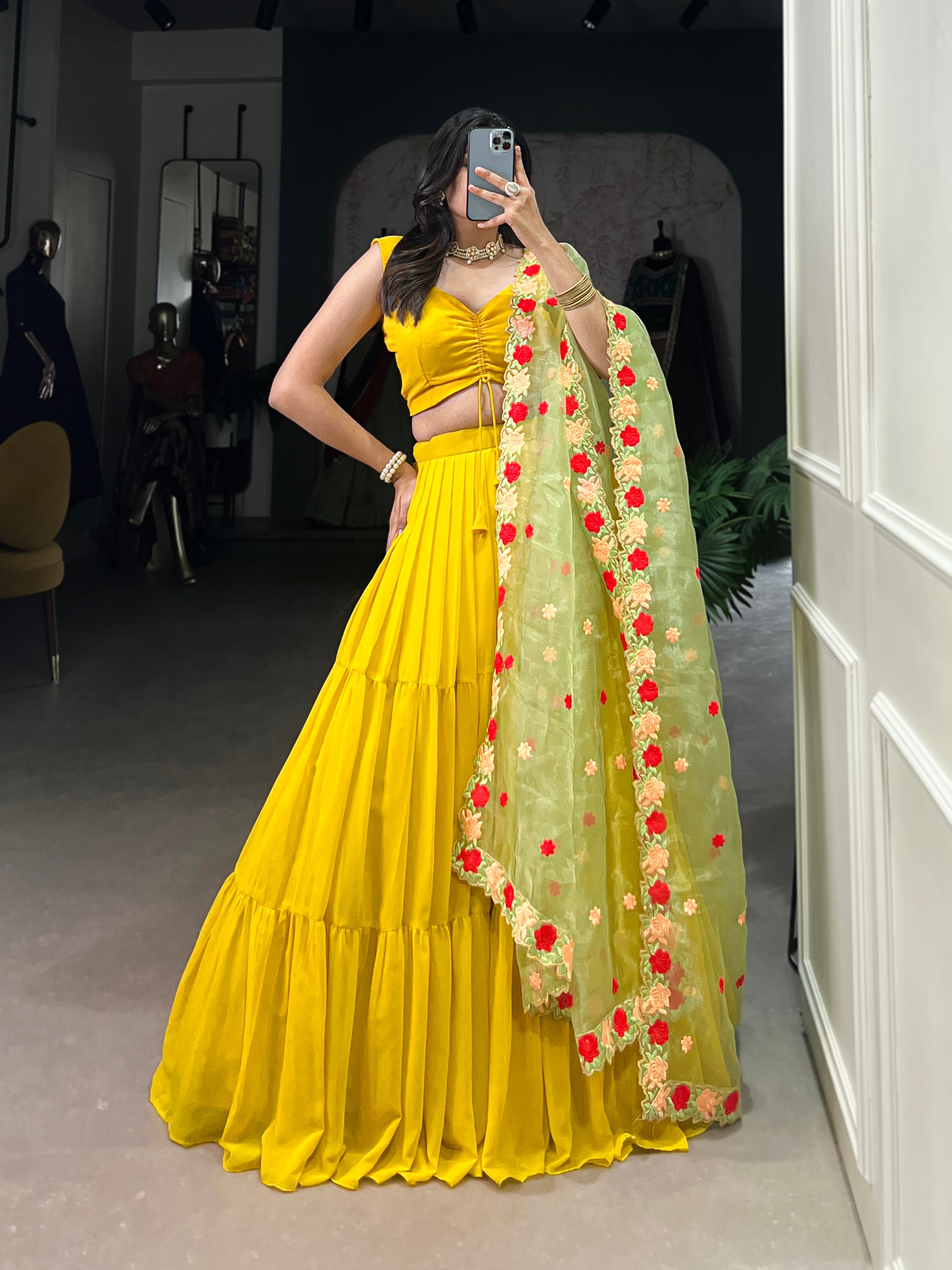 Yellow georgette plain lehenga choli with embroidered organza dupatta