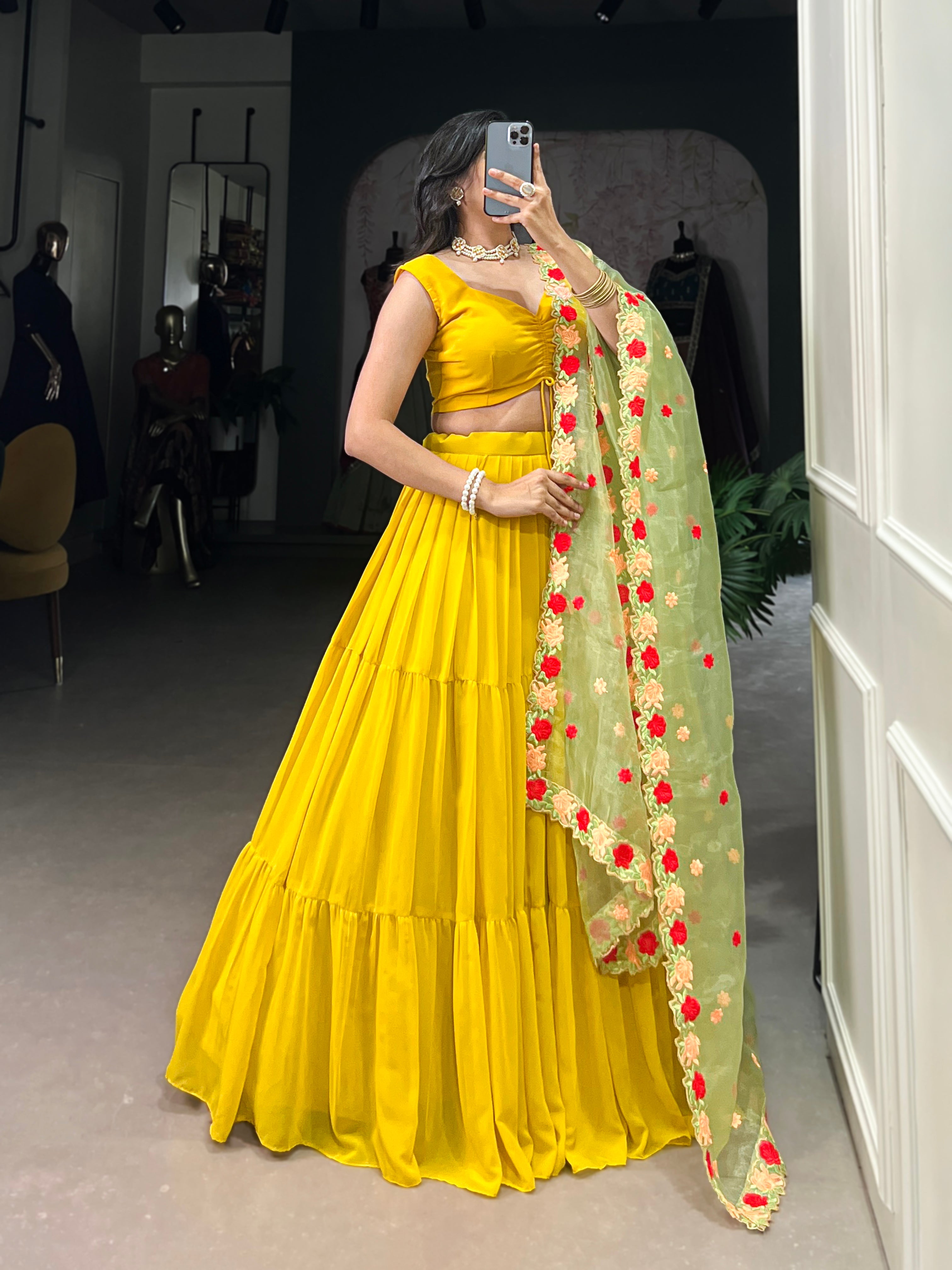 Yellow georgette plain lehenga choli with embroidered organza dupatta