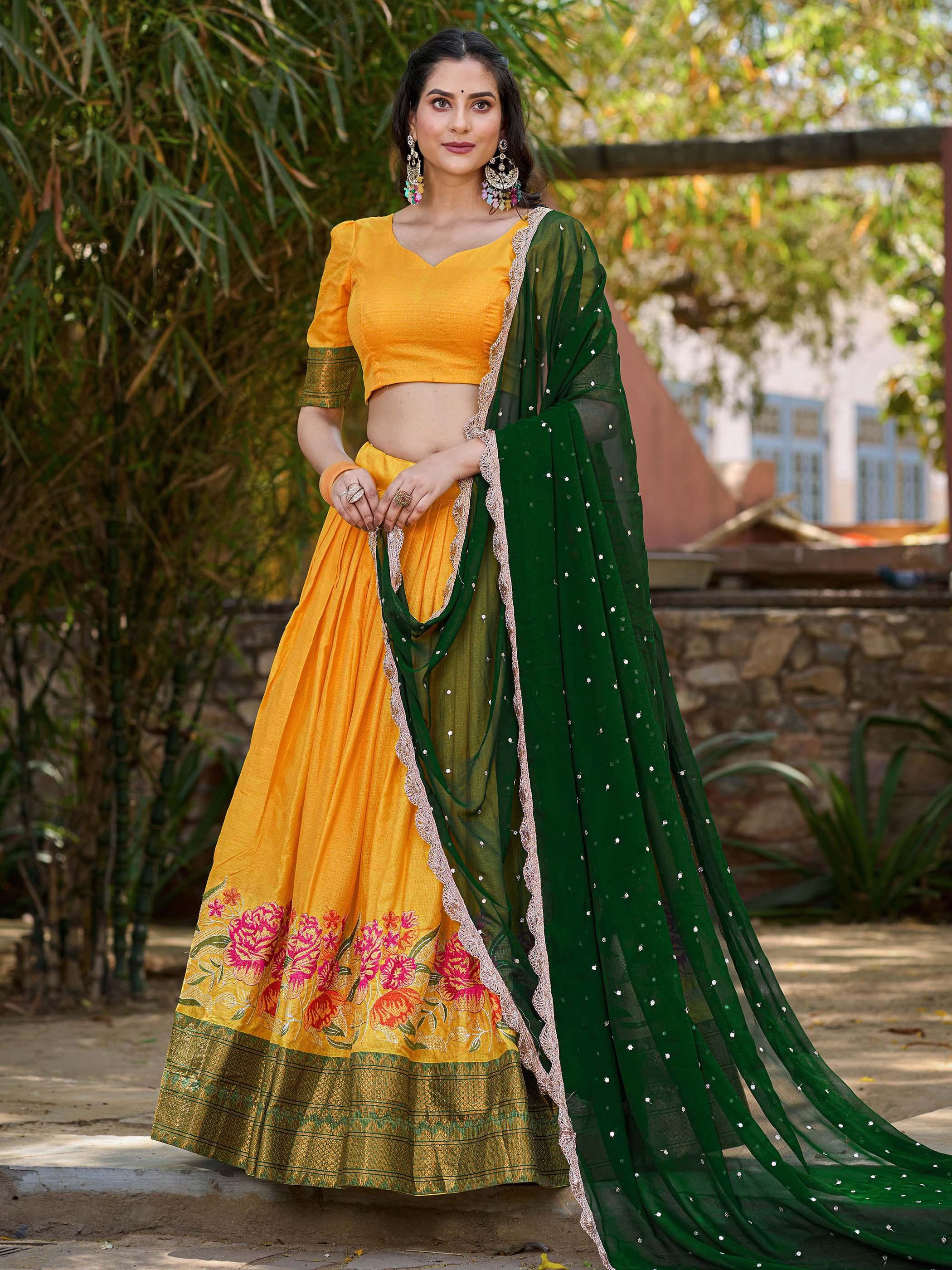 Elegant yellow cotton silk lehenga choli set with intricate embroidery and dupatta