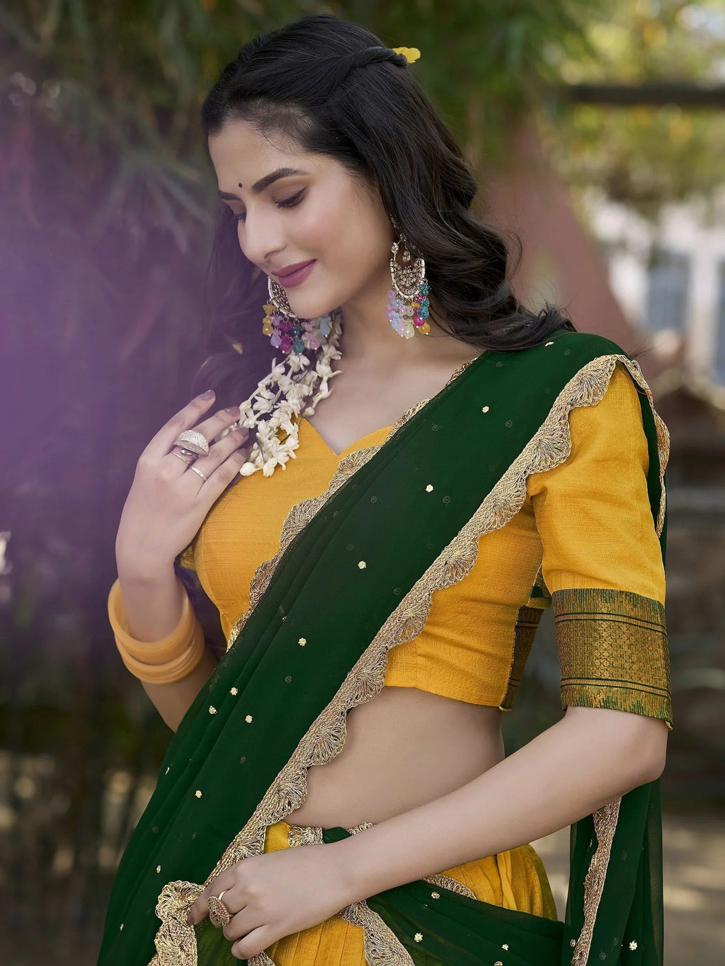 Elegant yellow cotton silk lehenga choli set with intricate embroidery and dupatta