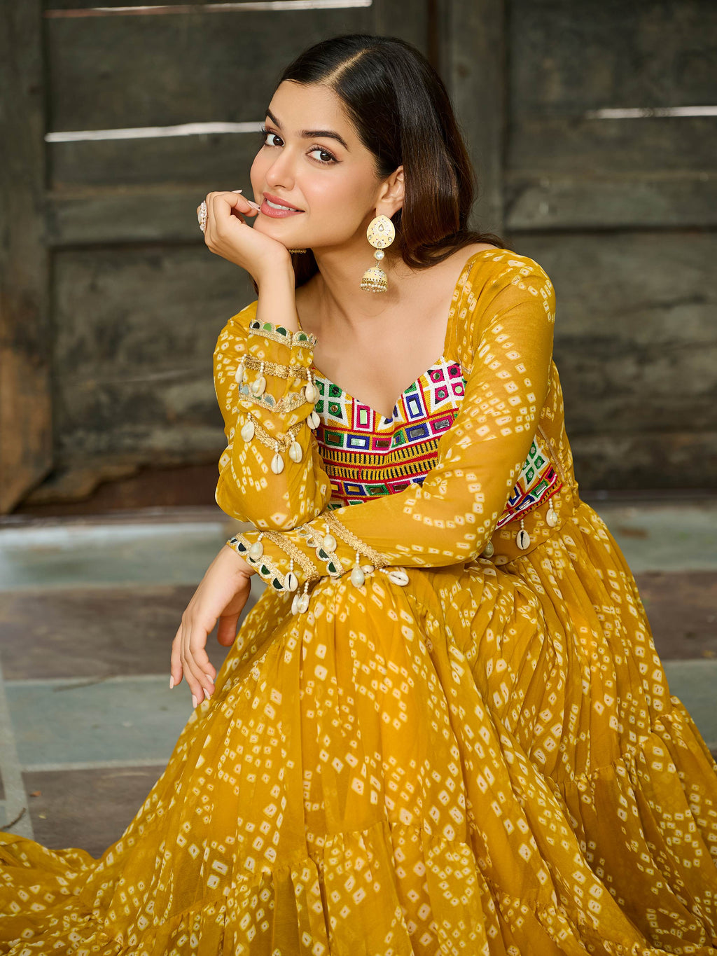 Yellow Bandhani print gown with Kutchi patchwork for Navratri