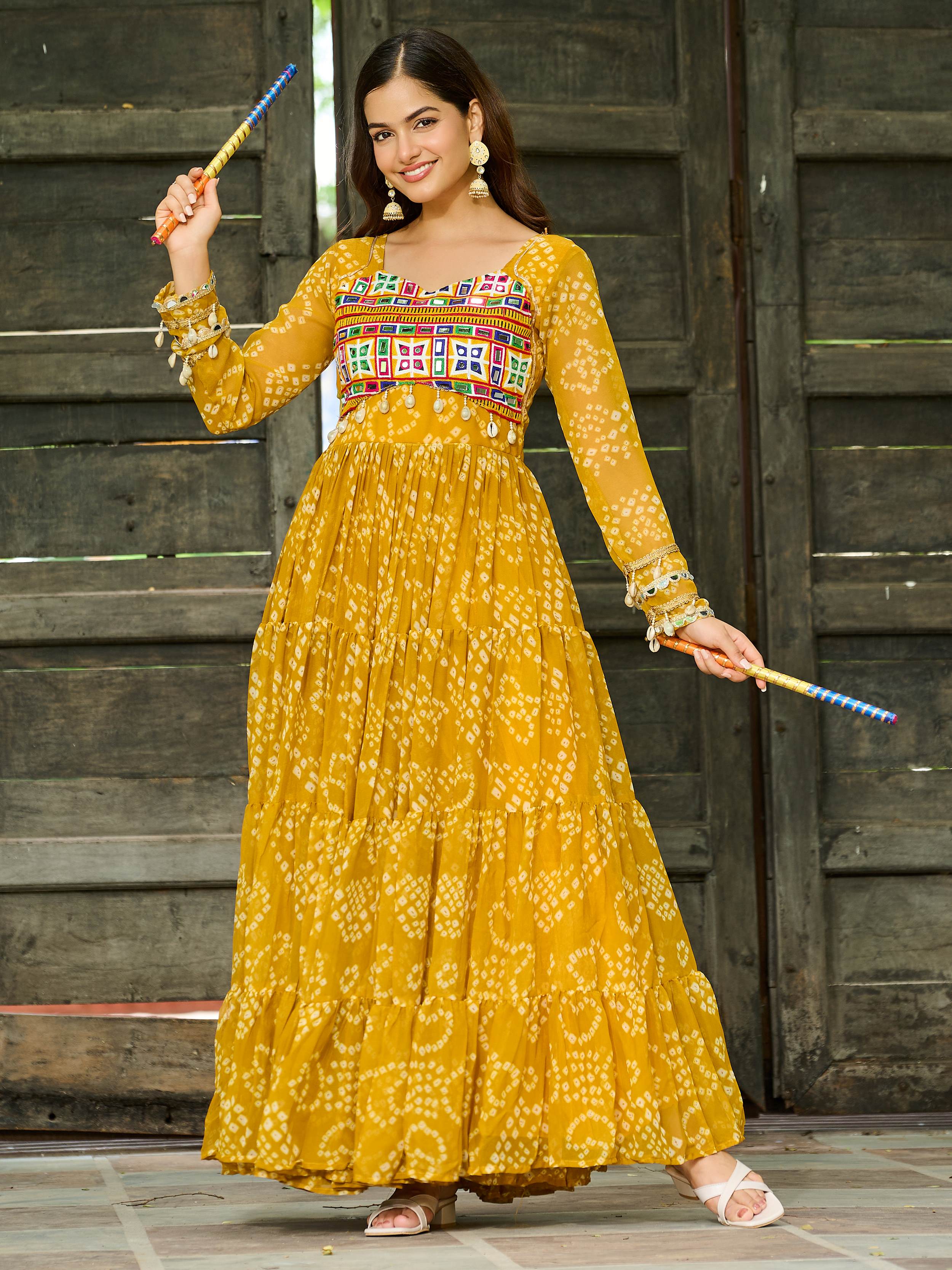 Yellow Bandhani print gown with Kutchi patchwork for Navratri
