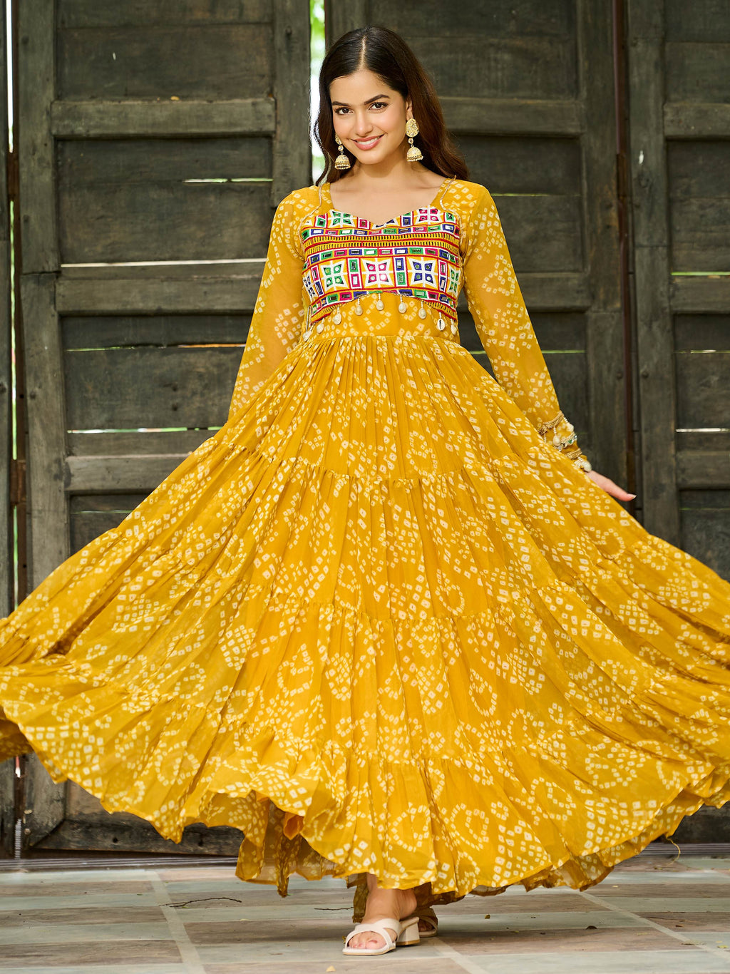Yellow Bandhani print gown with Kutchi patchwork for Navratri