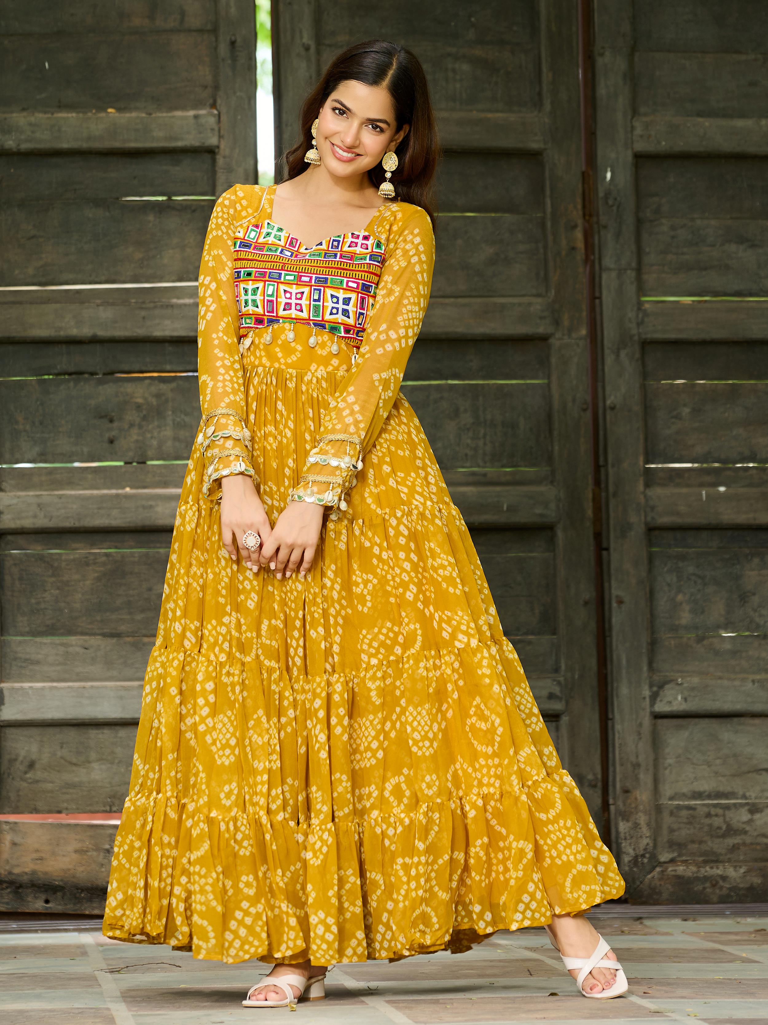 Yellow Bandhani print gown with Kutchi patchwork for Navratri