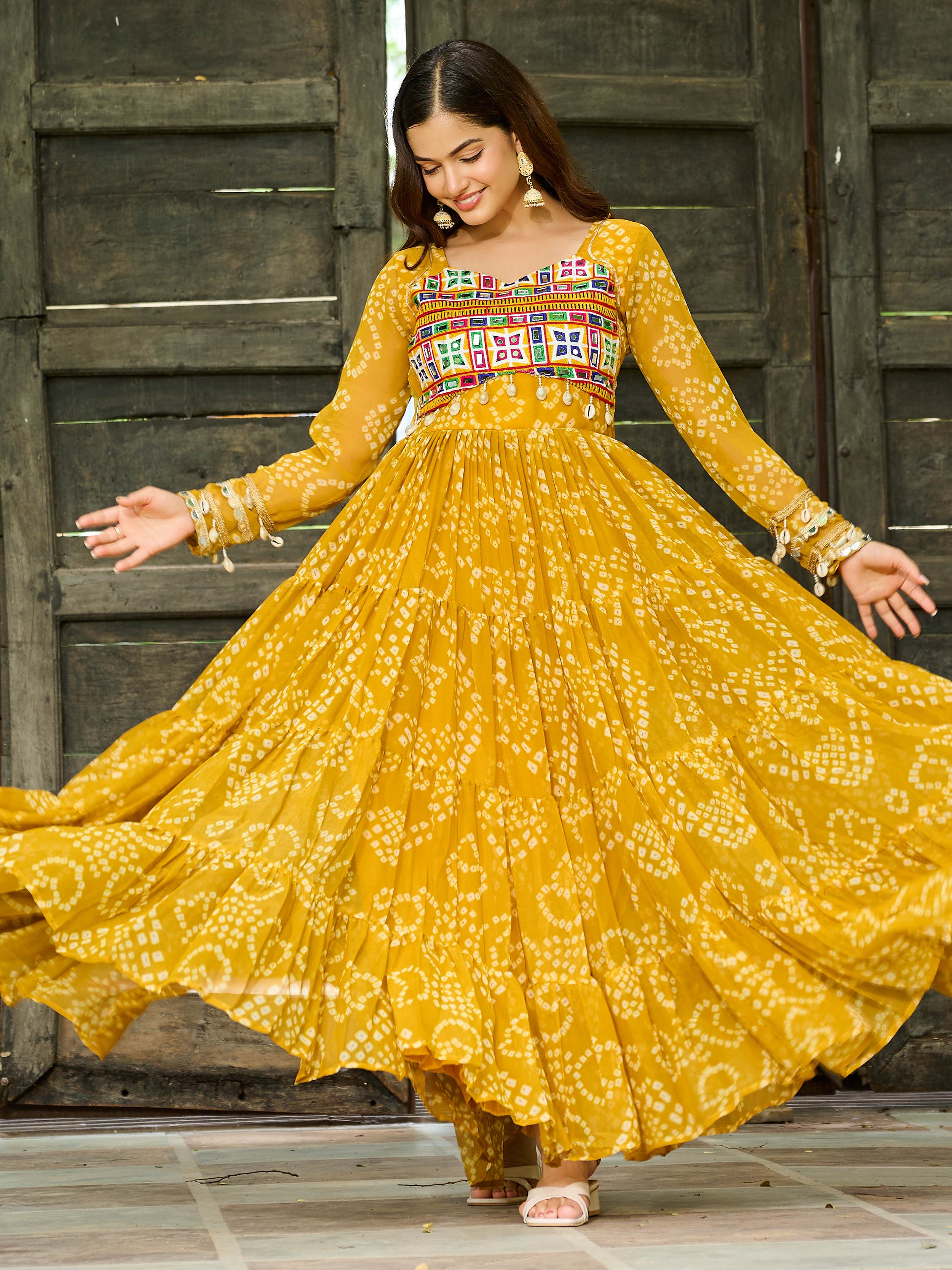 Yellow Bandhani print gown with Kutchi patchwork for Navratri