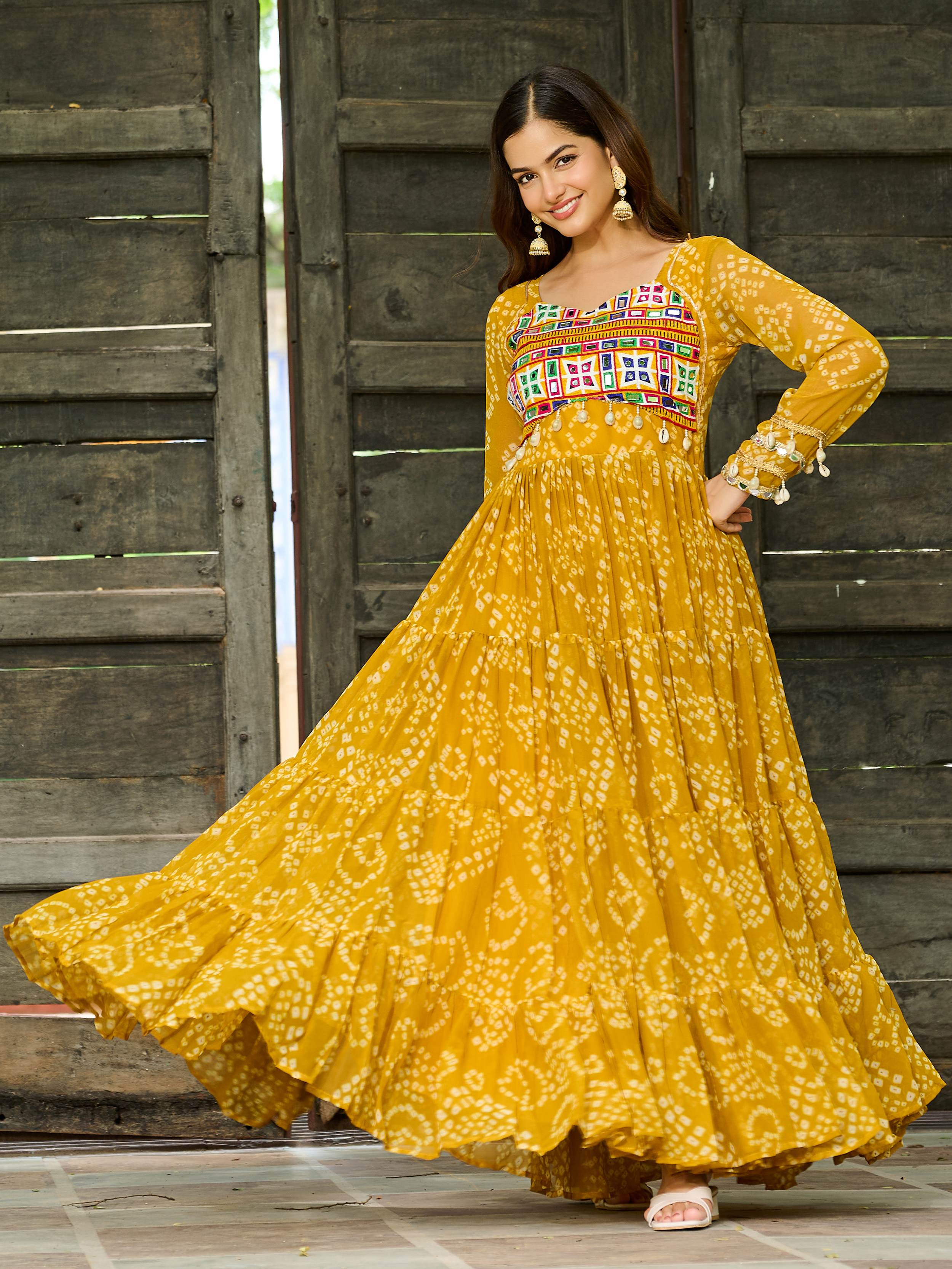 Yellow Bandhani print gown with Kutchi patchwork for Navratri