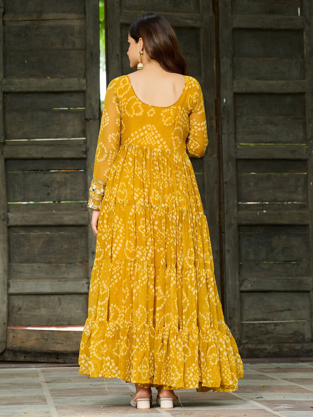 Yellow Bandhani print gown with Kutchi patchwork for Navratri