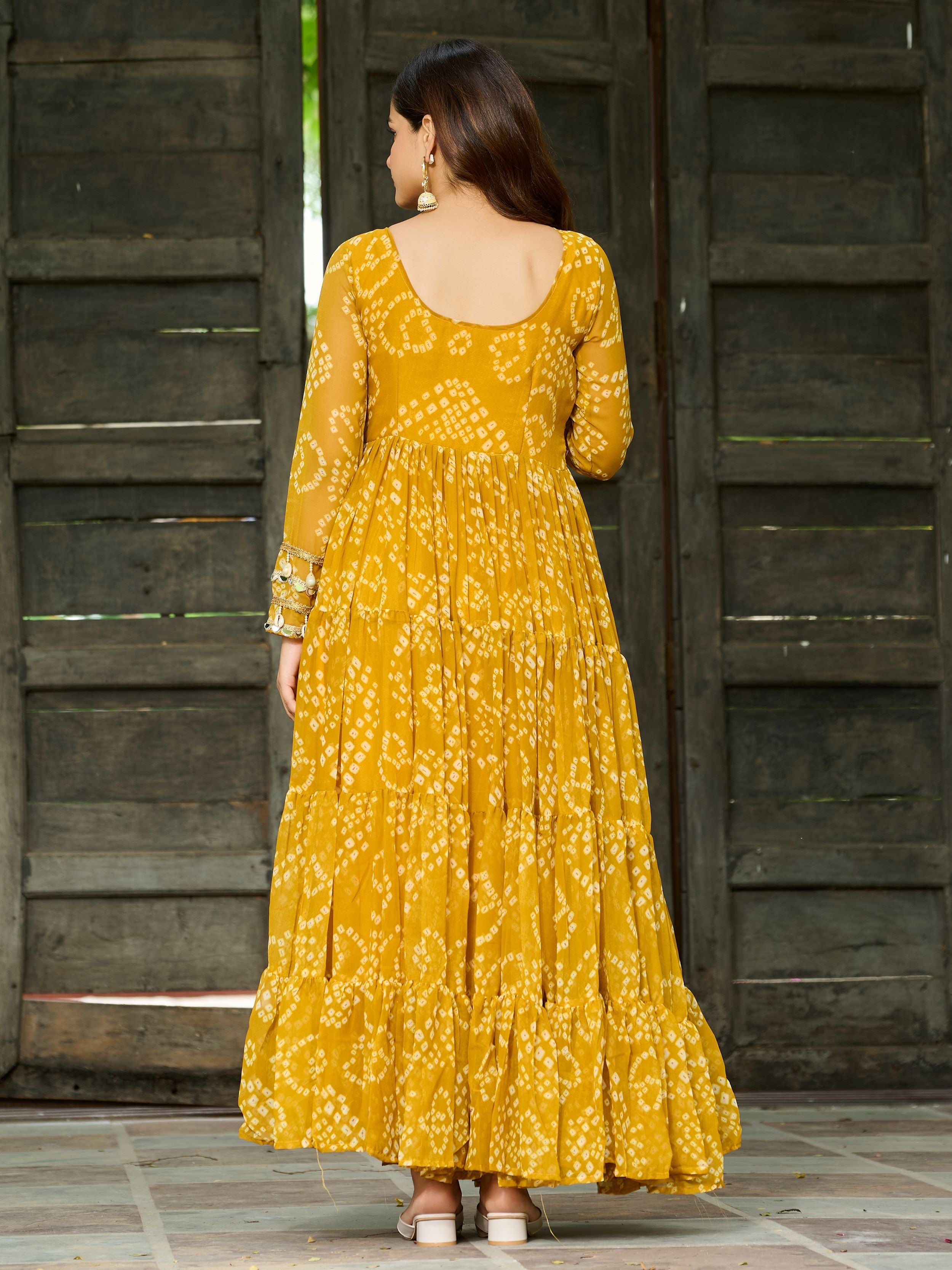 Yellow Bandhani print gown with Kutchi patchwork for Navratri