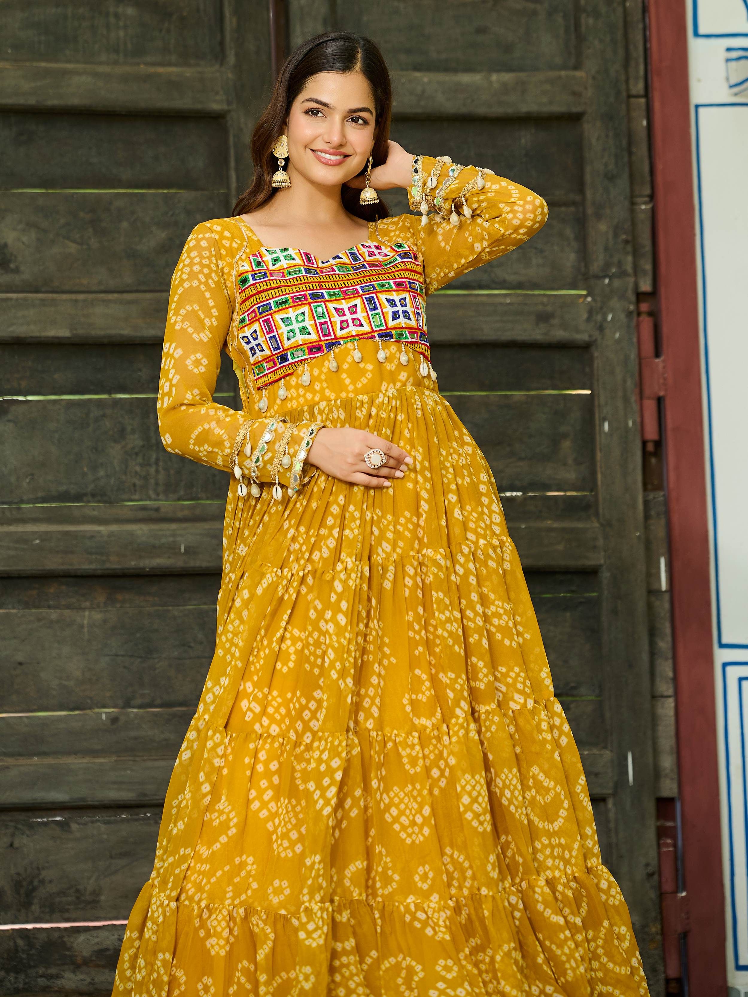 Yellow Bandhani print gown with Kutchi patchwork for Navratri