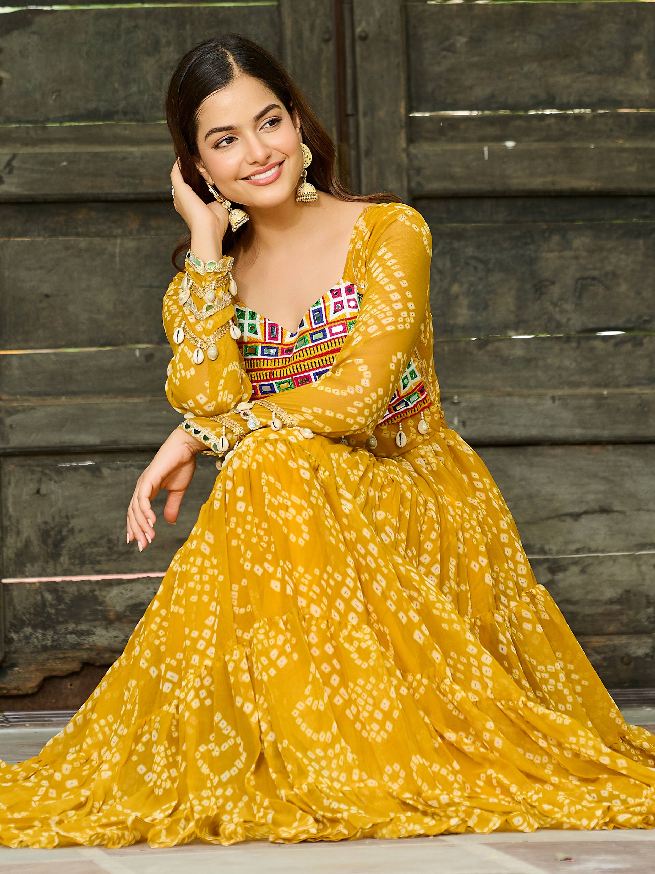 Yellow Bandhani print gown with Kutchi patchwork for Navratri