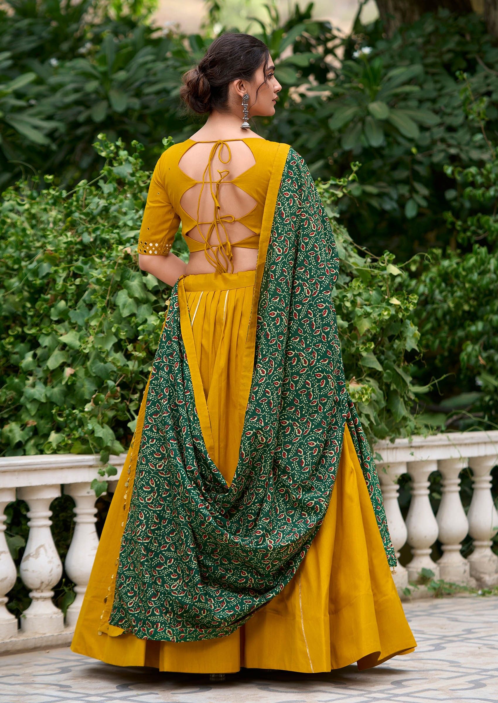 Yellow pure cotton lehenga choli with coin lace border and purse
