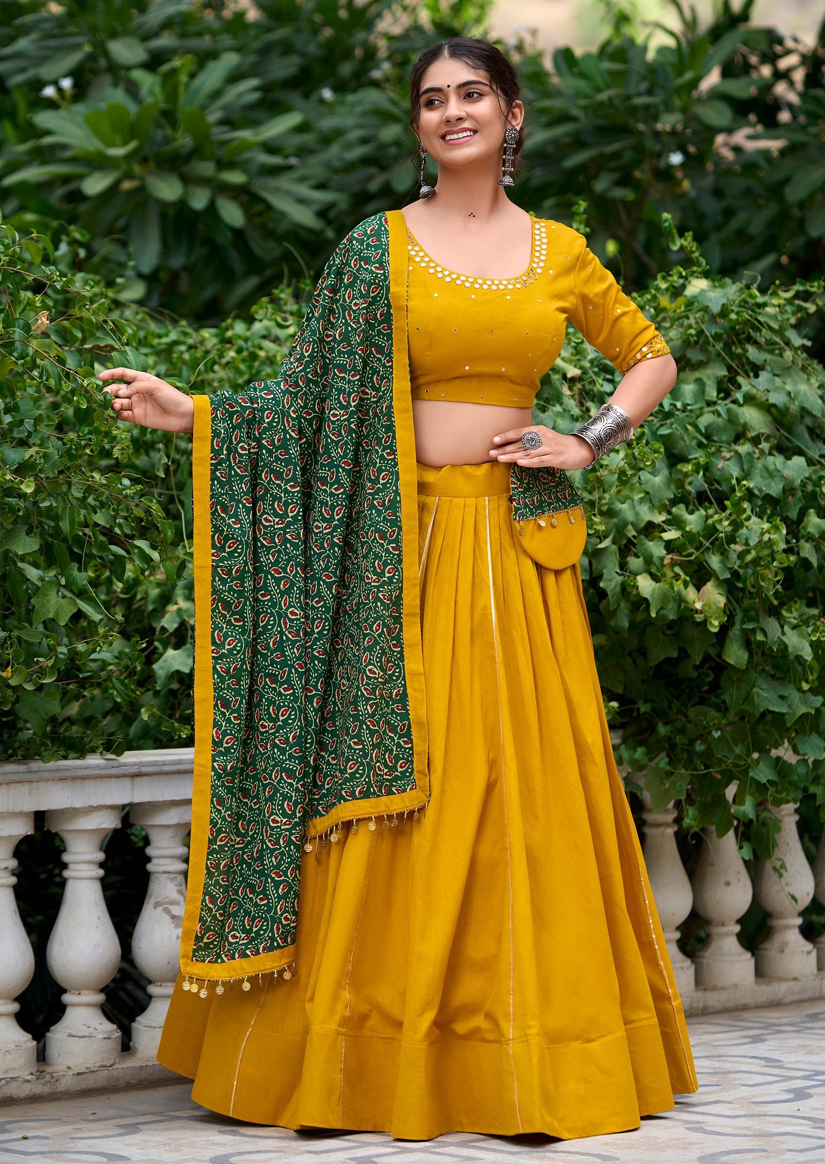 Yellow pure cotton lehenga choli with coin lace border and purse