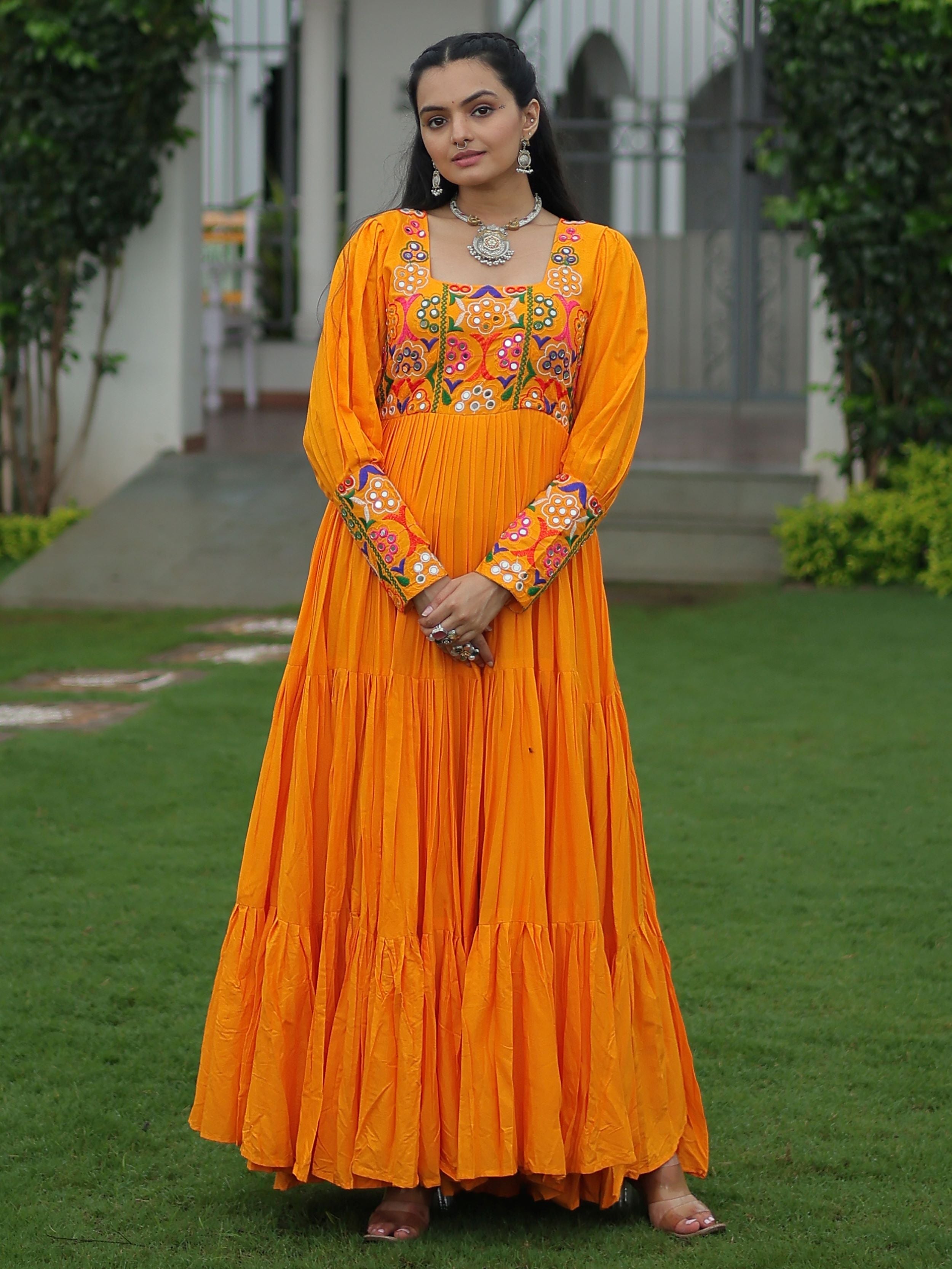 Yellow rayon flair gown with kutchi gamthi work for navratri