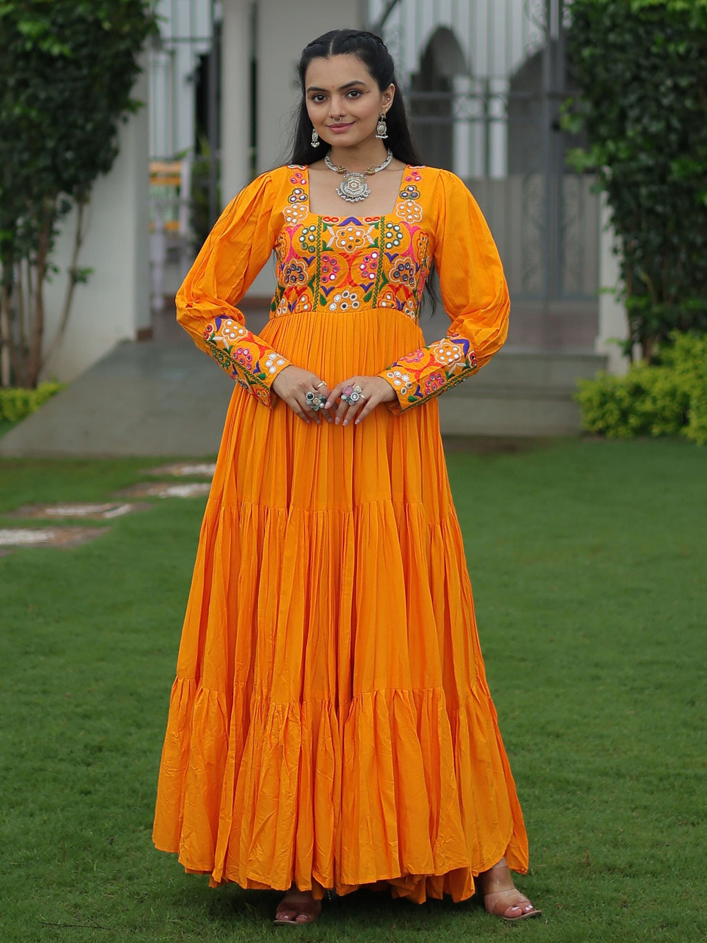 Yellow rayon flair gown with kutchi gamthi work for navratri