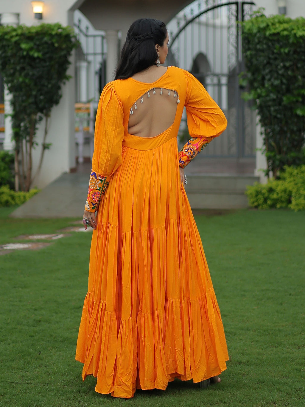 Yellow rayon flair gown with kutchi gamthi work for navratri