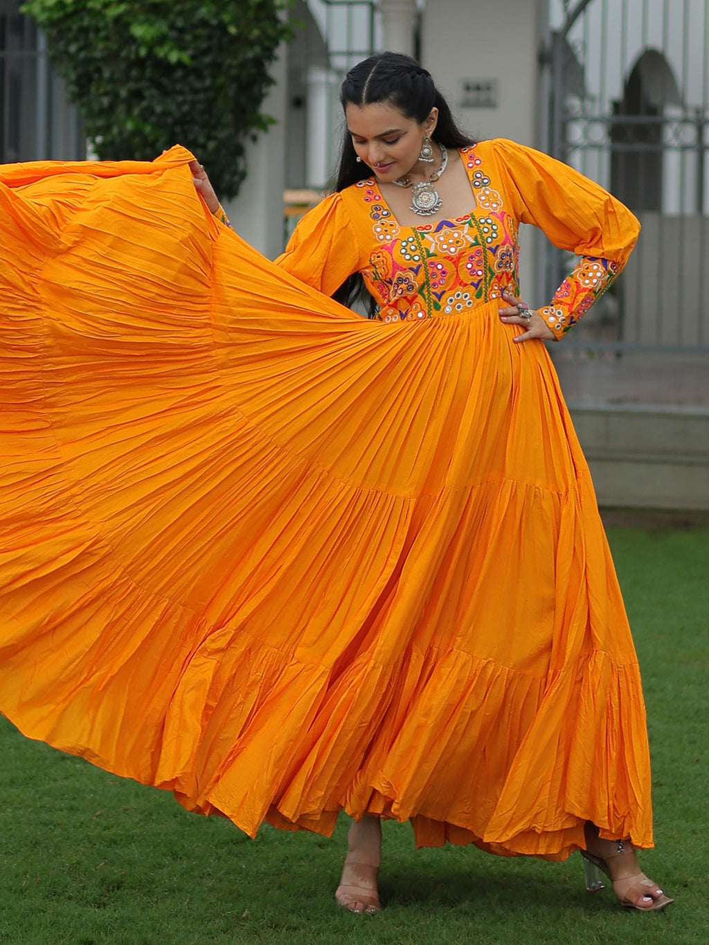 Yellow rayon flair gown with kutchi gamthi work for navratri
