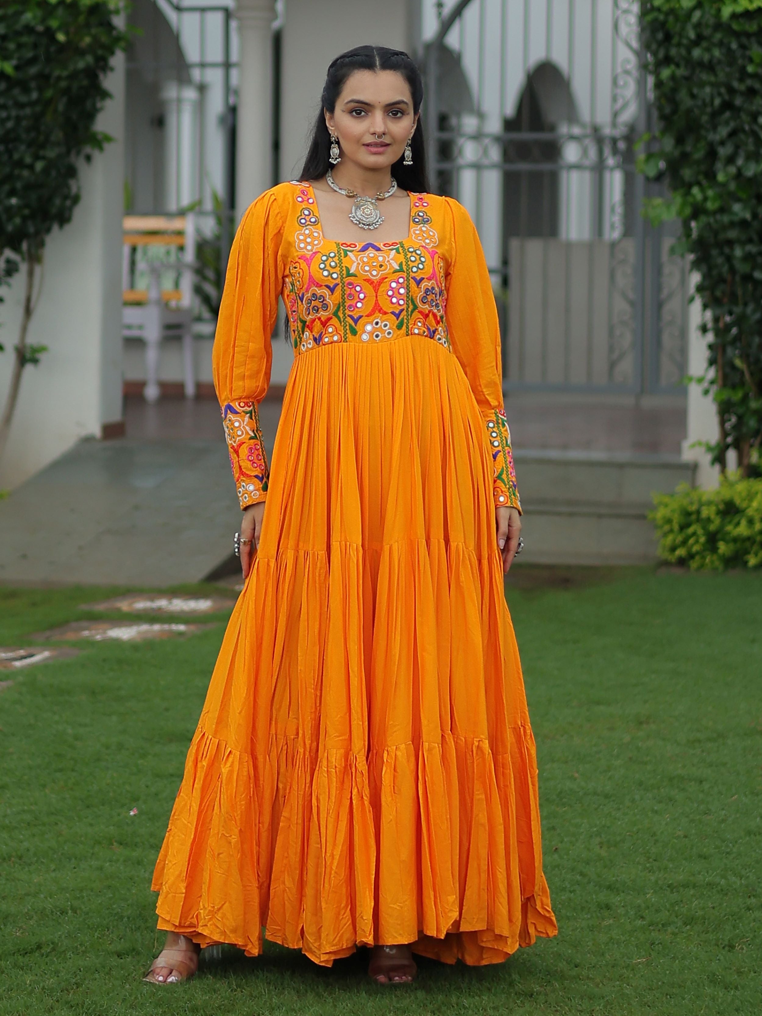 Yellow rayon flair gown with kutchi gamthi work for navratri