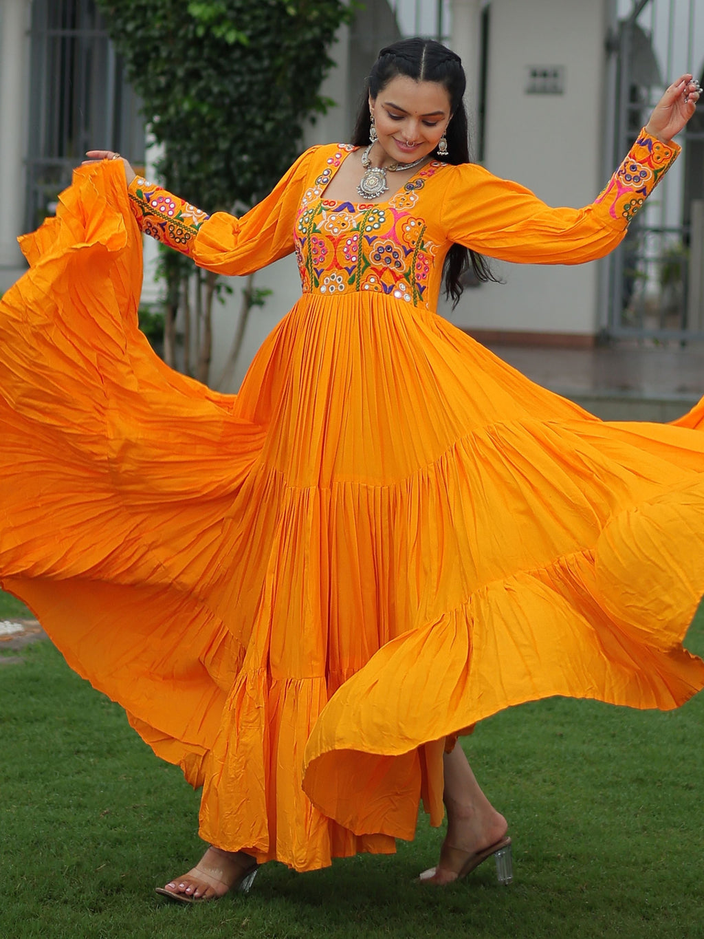 Yellow rayon flair gown with kutchi gamthi work for navratri