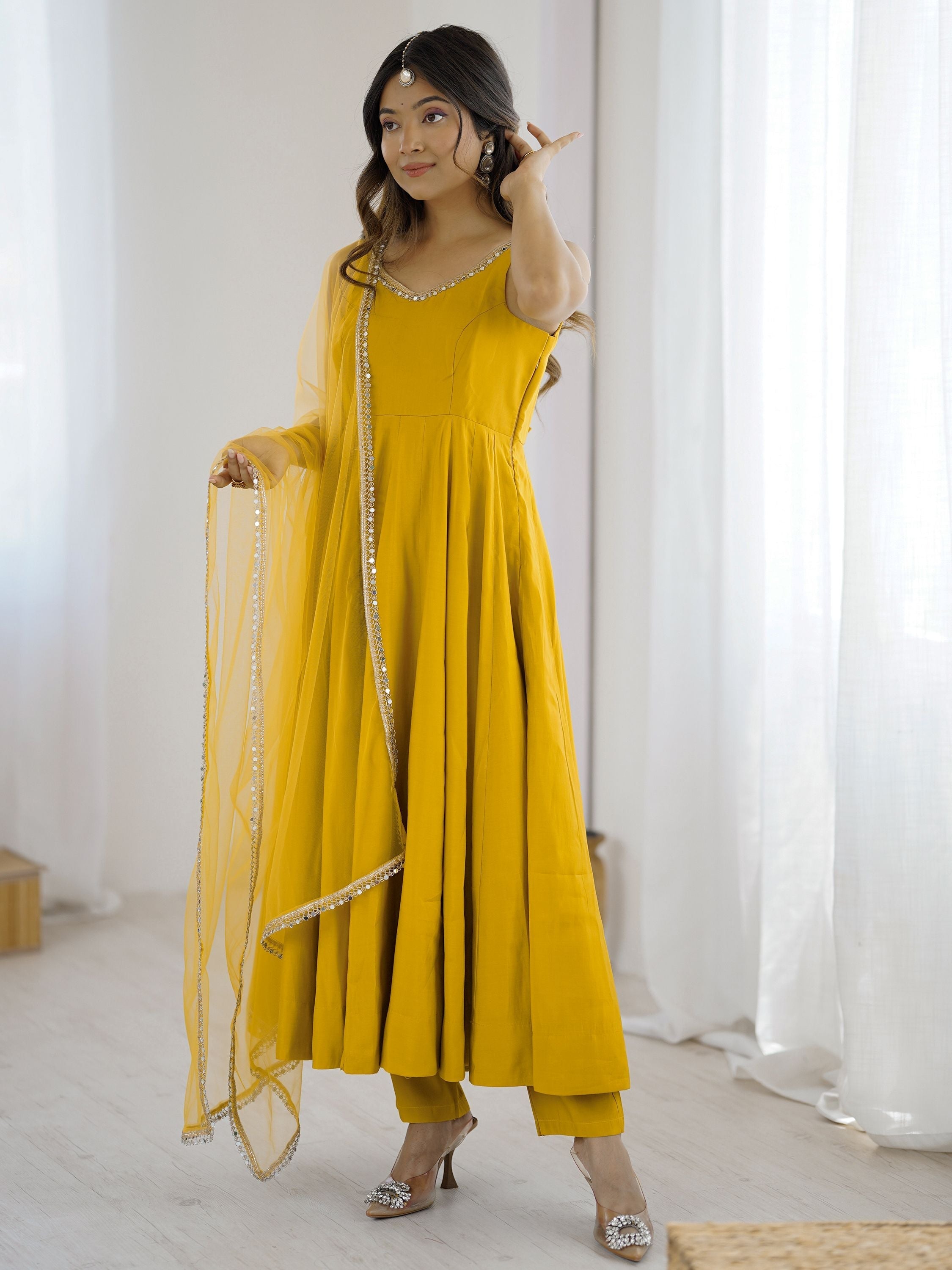 Yellow silk Anarkali suit with mirror lace work and dupatta