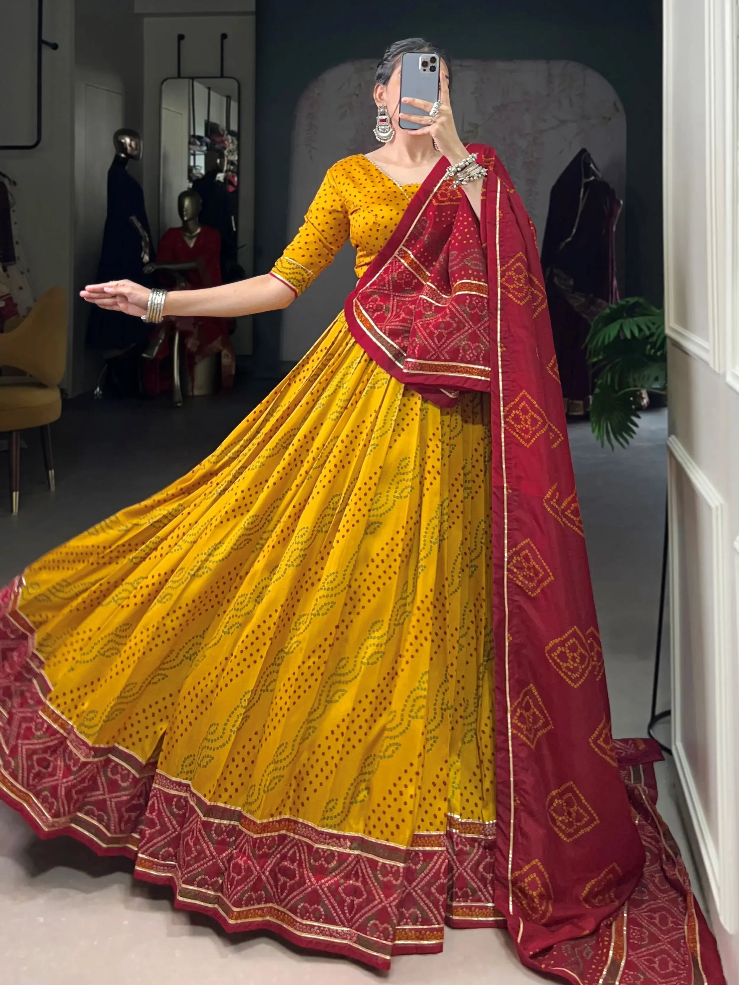 Yellow silk lehenga choli with Bandhani print and Gotta Patti lace