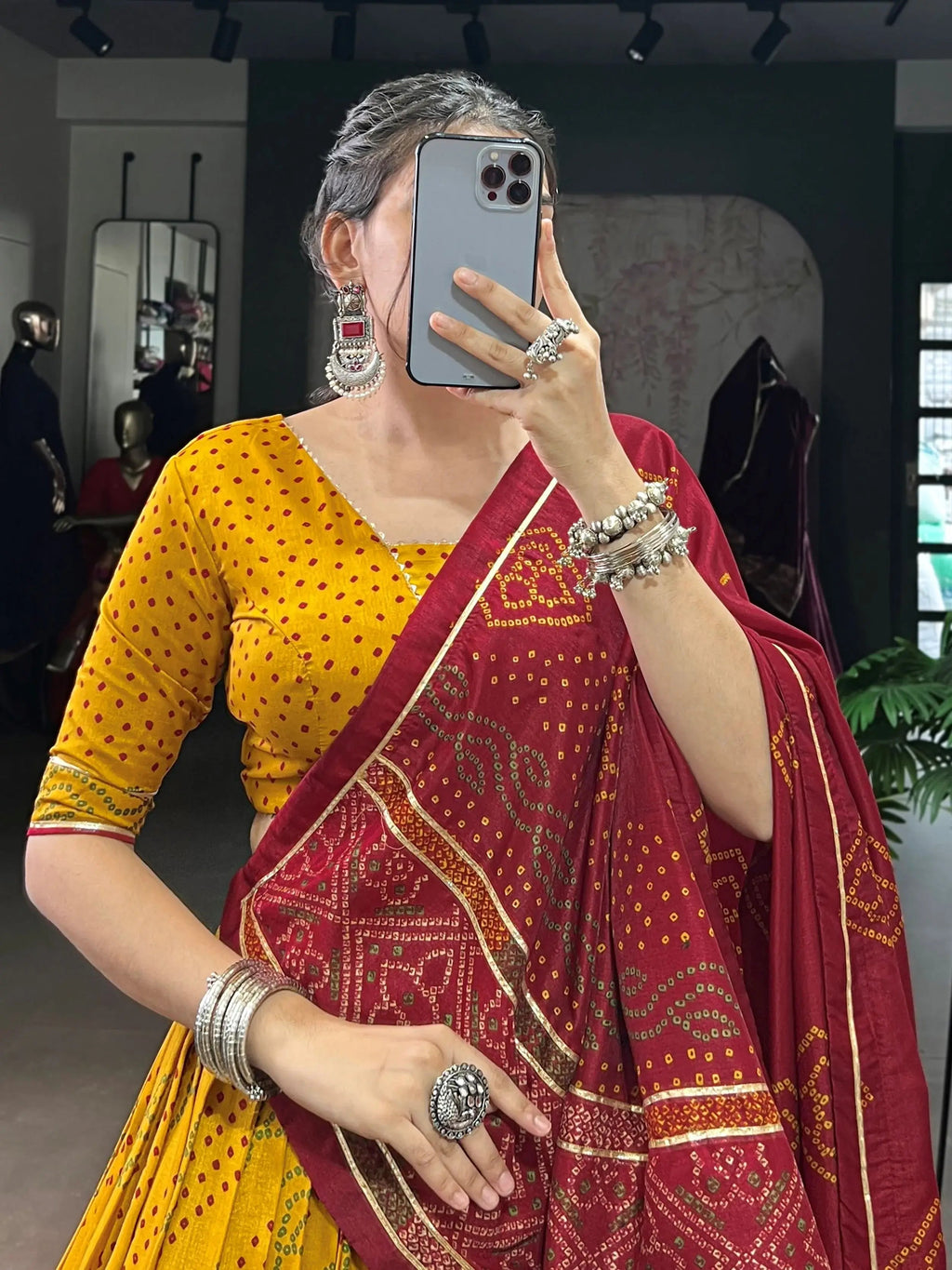 Yellow silk lehenga choli with Bandhani print and Gotta Patti lace