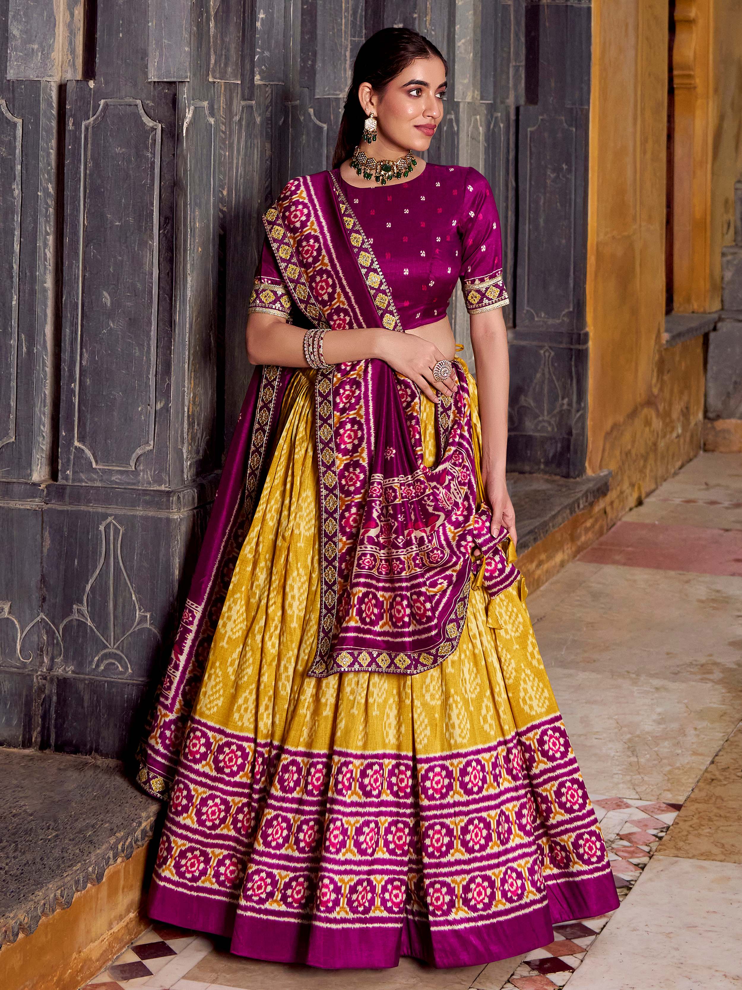 Yellow silk print and sequins thread embroidery lehenga with dupatta
