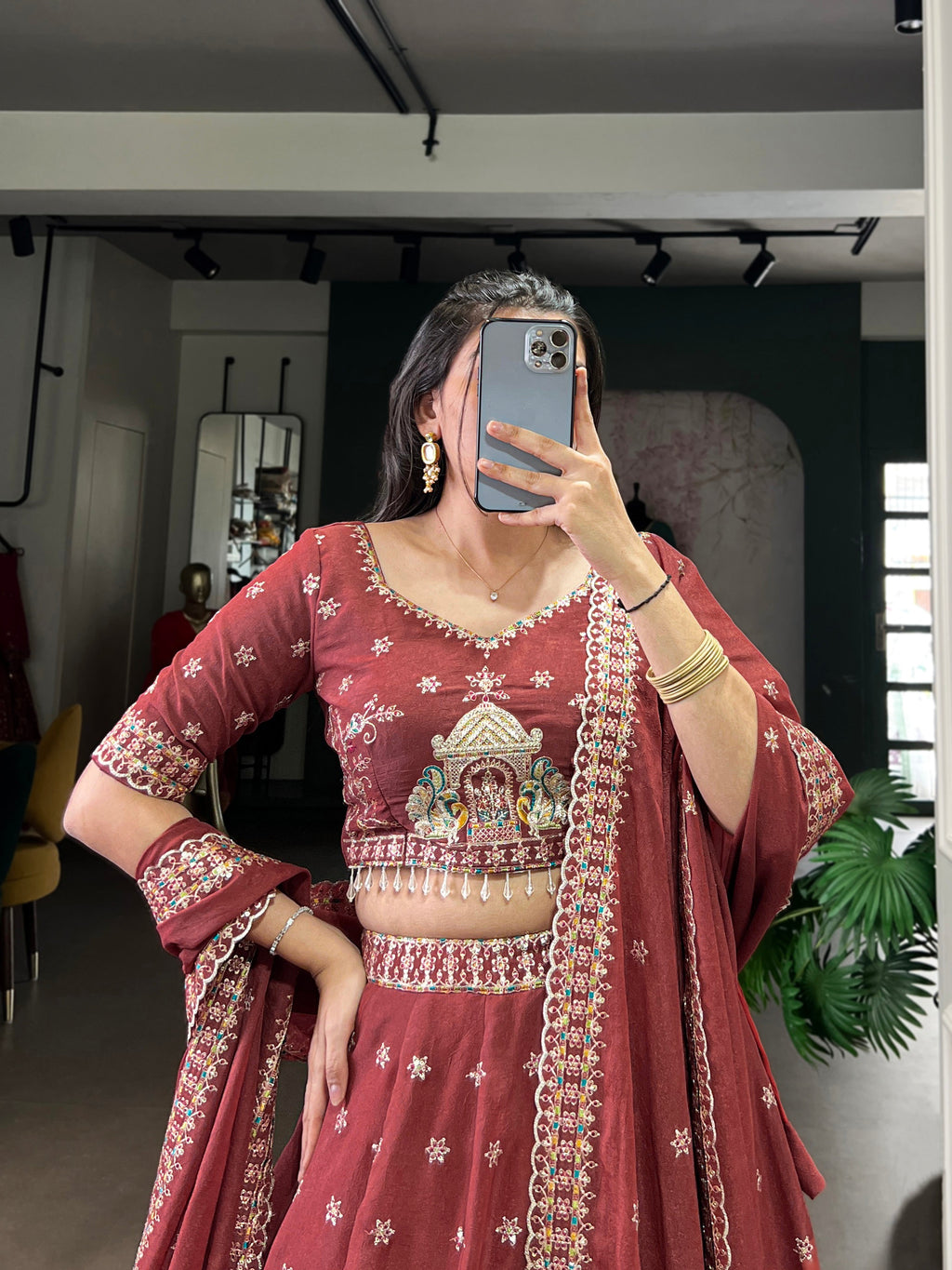 Zarakh rust maroon silk lehenga choli with sequins and thread embroidery