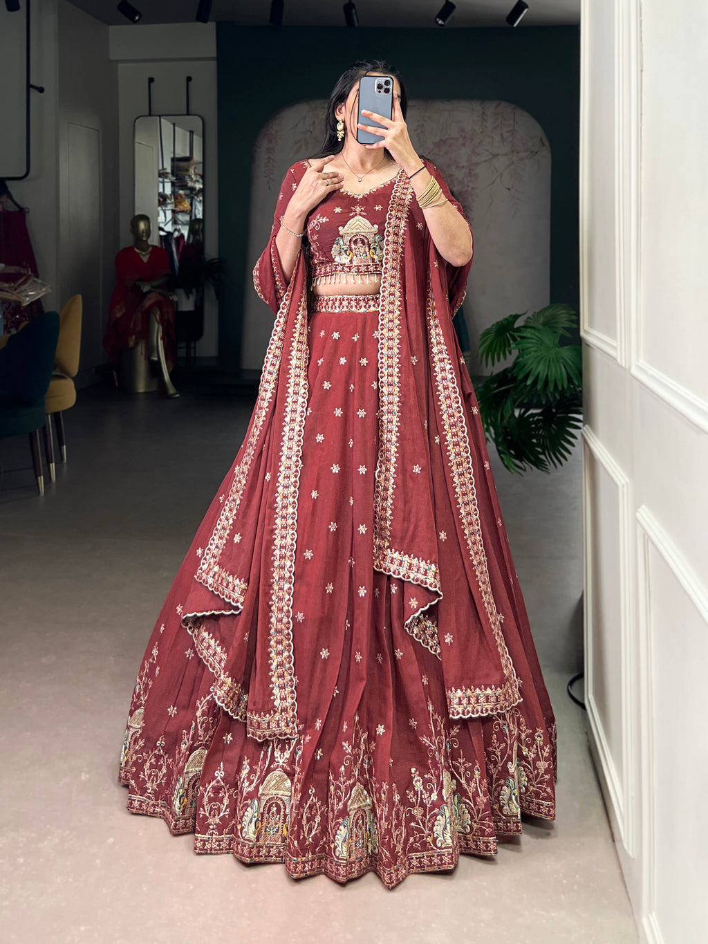 Zarakh rust maroon silk lehenga choli with sequins and thread embroidery
