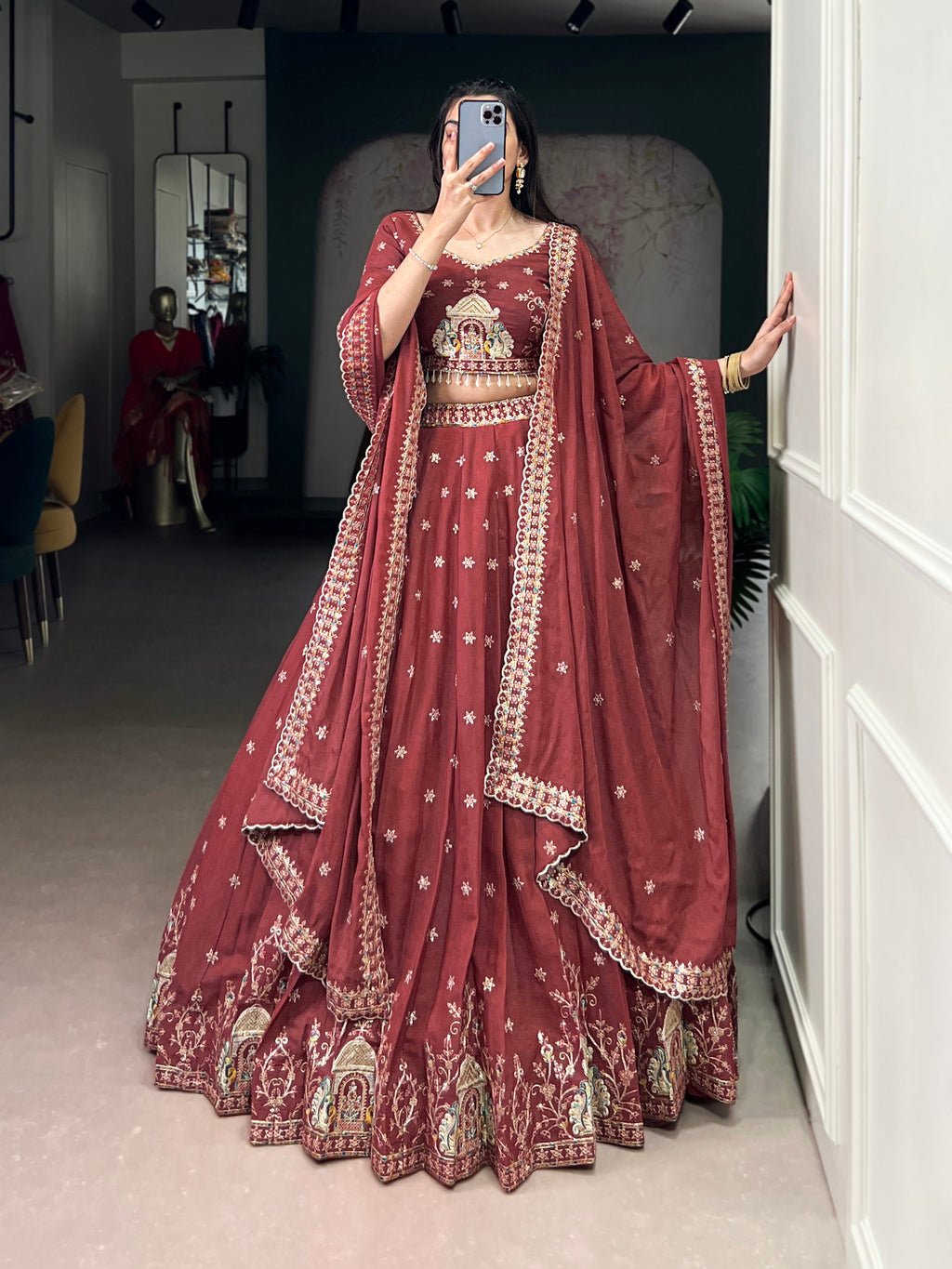 Zarakh rust maroon silk lehenga choli with sequins and thread embroidery
