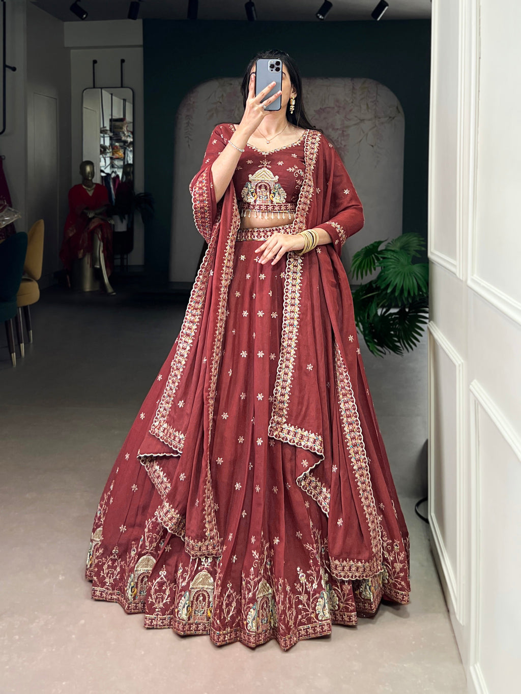 Zarakh rust maroon silk lehenga choli with sequins and thread embroidery